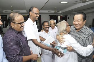Prathapan Thayat, Ajith Babu, K.V. Subhash, and Thayat Balan with Sri Chemancheri Kunhiraman Nair and Sri U. A. Khader 