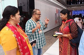 Prathapan Thayat and Sujaya K with Smt Kanimozhi Karunanidhi 