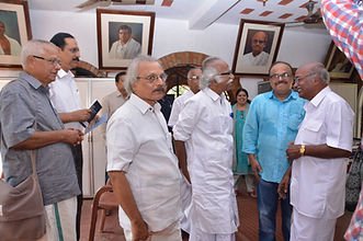 Prathapan Thayat with Sri M. Mukundan and Sri Kadannappalli Ramachandran