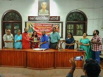 Prathapan Thayat in a Book Release Function at Thrissur with Sri V. S. Sunil Kumar