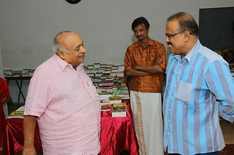 Prathapan Thayat with Sri M.P. Veerendra Kumar