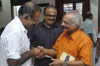 Prathapan Thayat with Minister Sri A.K. Saseendran and Sri M. Mukundan